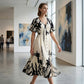 Vestido midi elegante con escote en V y estampado botánic