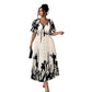 Vestido midi elegante con escote en V y estampado botánic